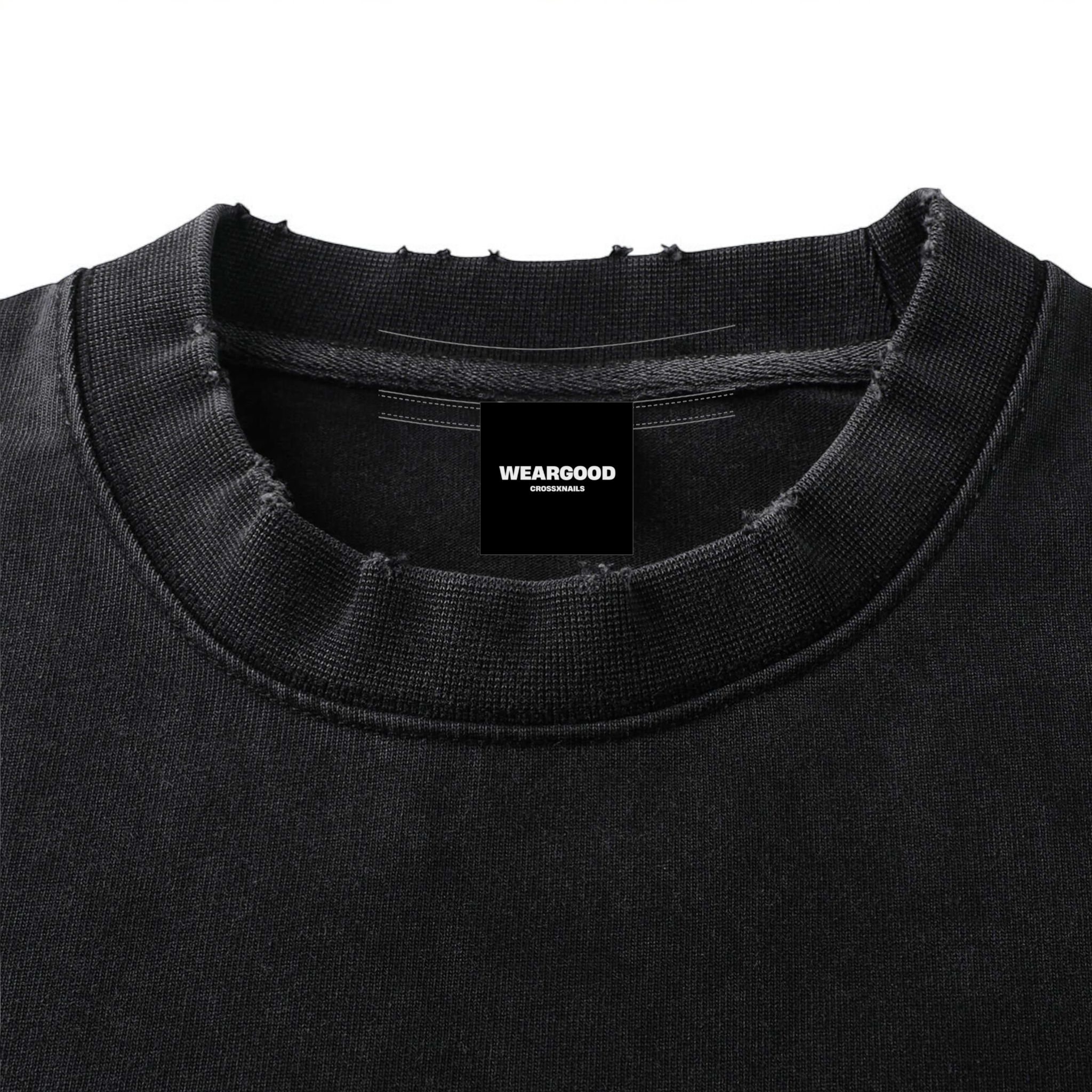 Close-up of the neckline of a black oversized t-shirt by Crossxnails WearGood, featuring a relaxed fit and premium cotton fabric.