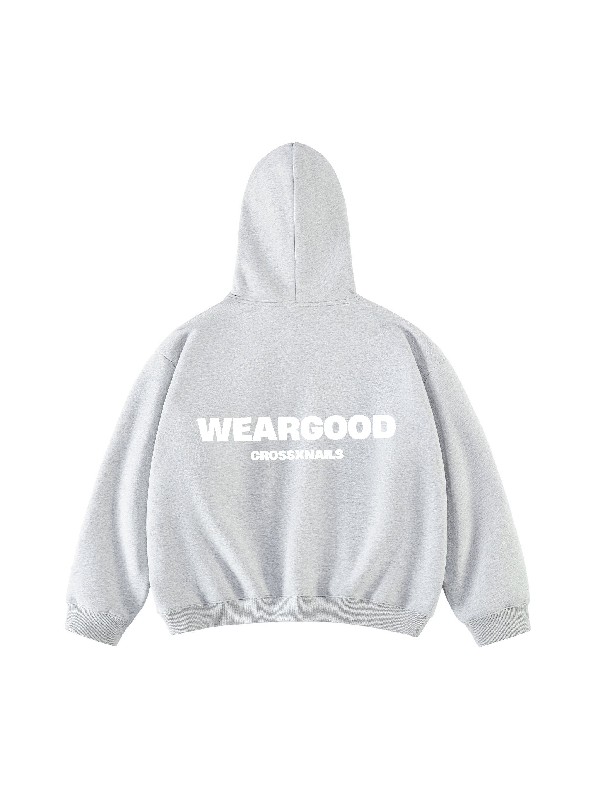 Gray boxy hoodie featuring 'WEARGOOD' text and a cozy fleece design, perfect for modern streetwear style.