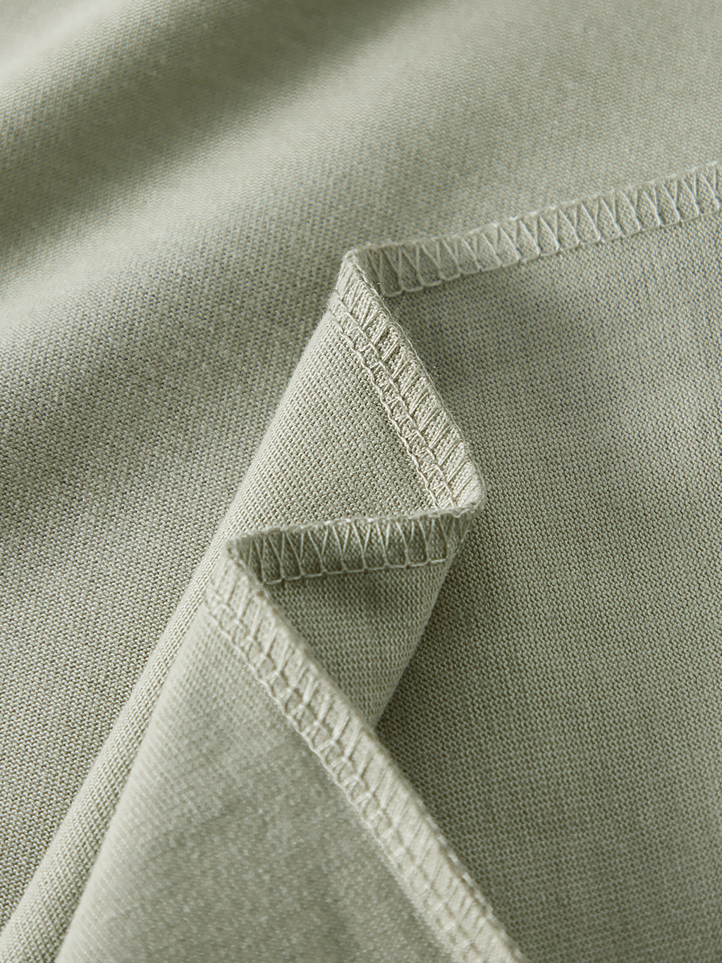 Crossxnails WearGood oversized unisex t-shirt close-up on soft fabric, ideal for Christian streetwear UK, shop online Ipswich.