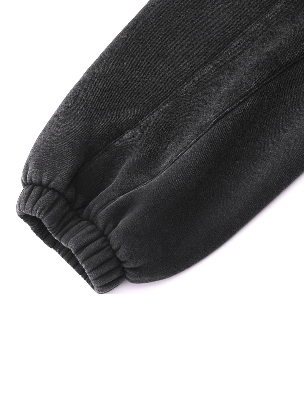 Close-up of Crossxnails Fleeced Jogger Sweatpants, premium cotton blend, relaxed fit, UK streetwear design.
