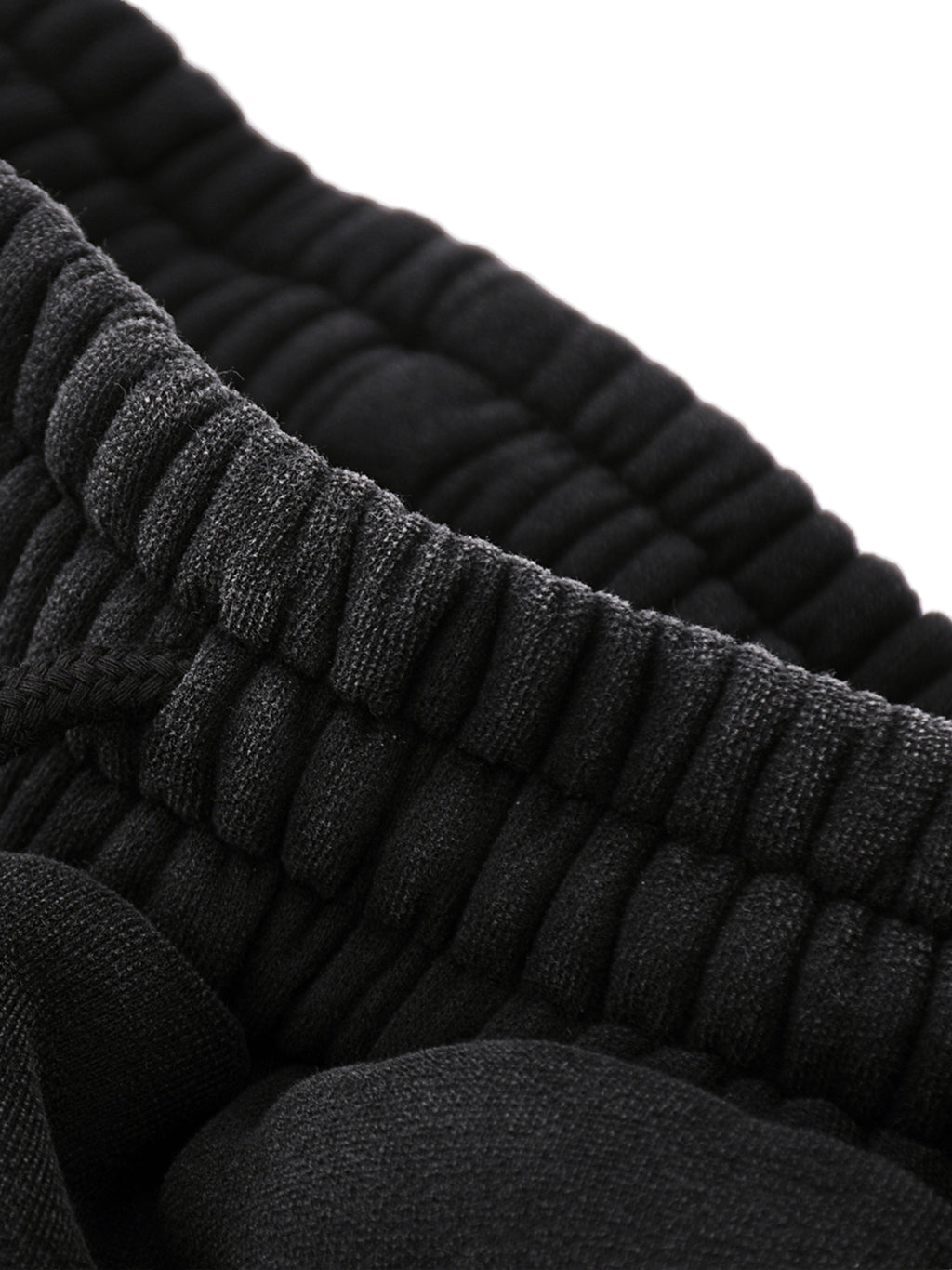 Close-up of Crossxnails Fleeced Jogger Sweatpants waistband, premium cotton-poly blend, relaxed fit, Christian streetwear UK.