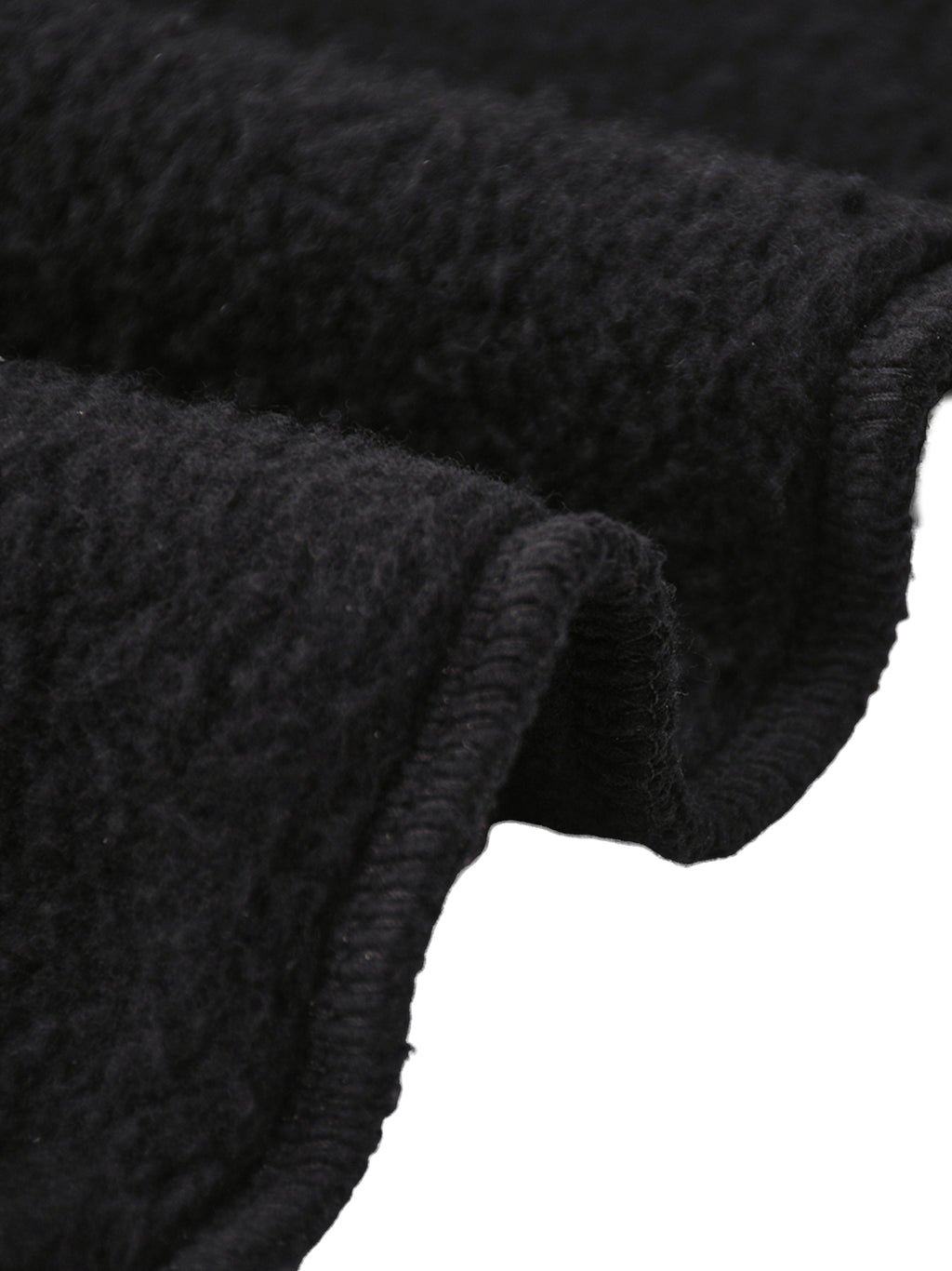 Close-up of soft black fleece fabric, featuring thick texture for Crossxnails Fleeced Jogger Pants, ideal for streetwear comfort.