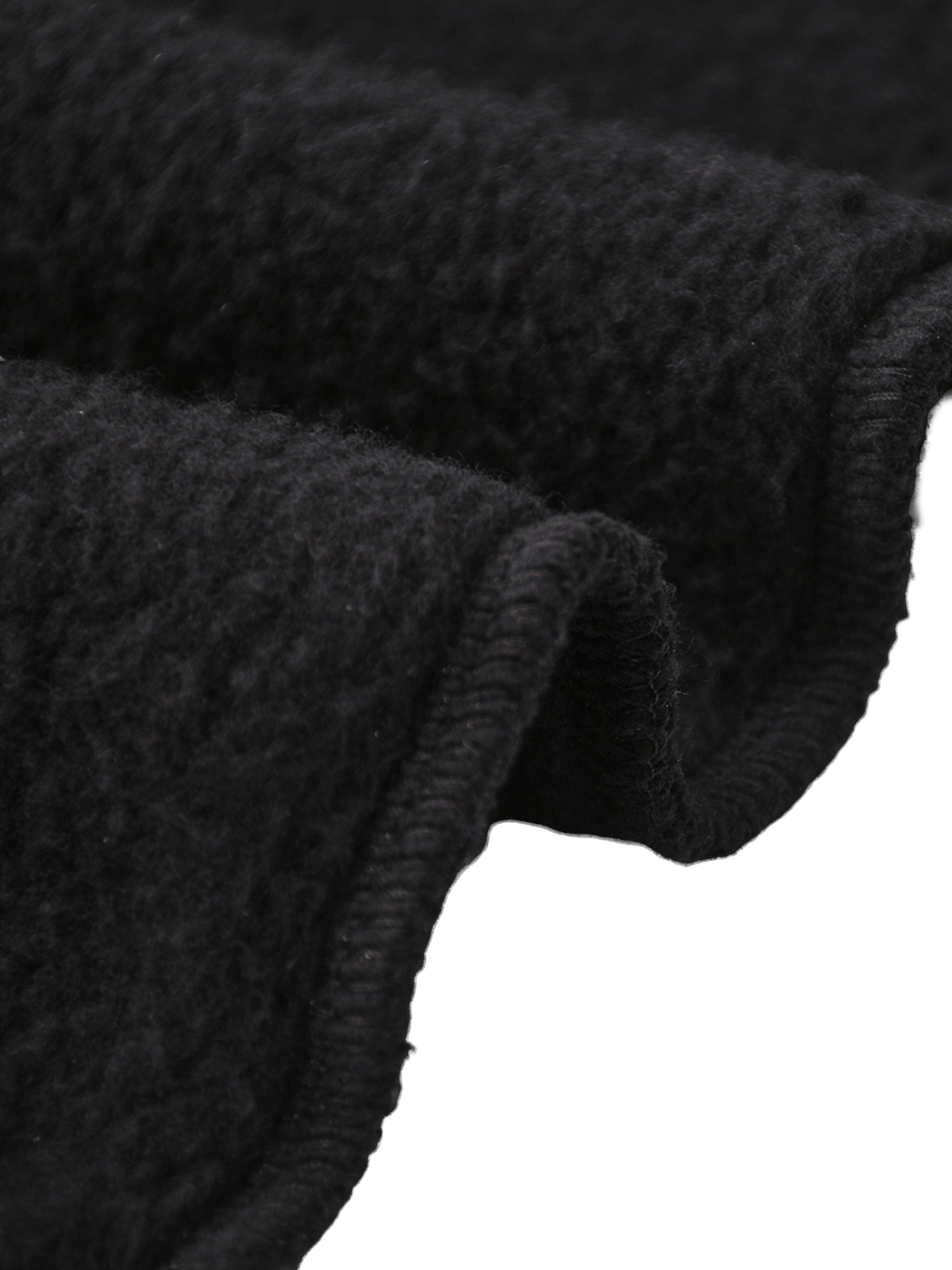 Close-up of soft black fleece fabric, featuring thick texture for Crossxnails Fleeced Jogger Pants, ideal for streetwear comfort.