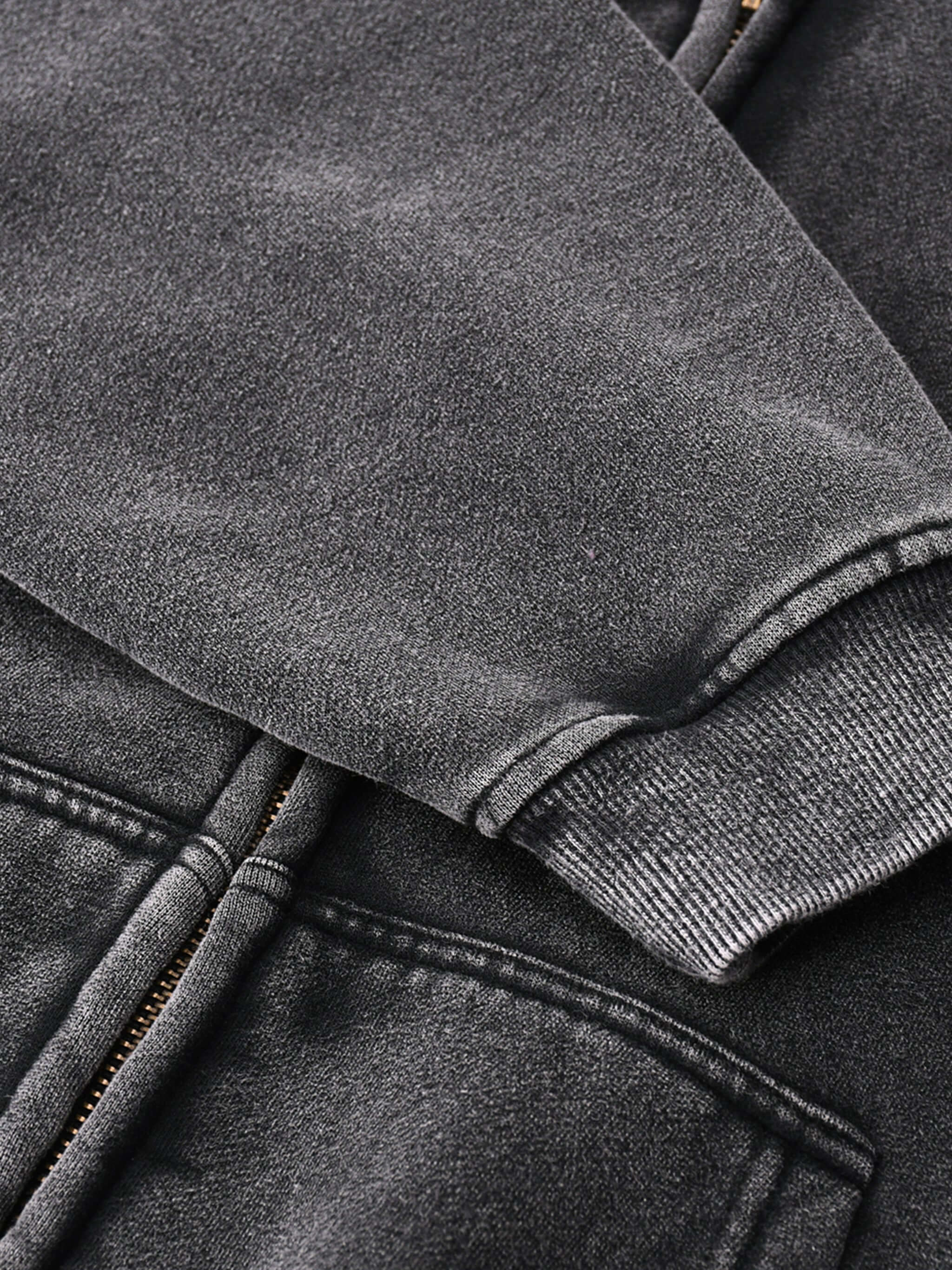 Close-up of Crossxnails Zip-Up Boxy Hoodie sleeve, vintage-washed, heavy cotton blend, Christian streetwear UK design.