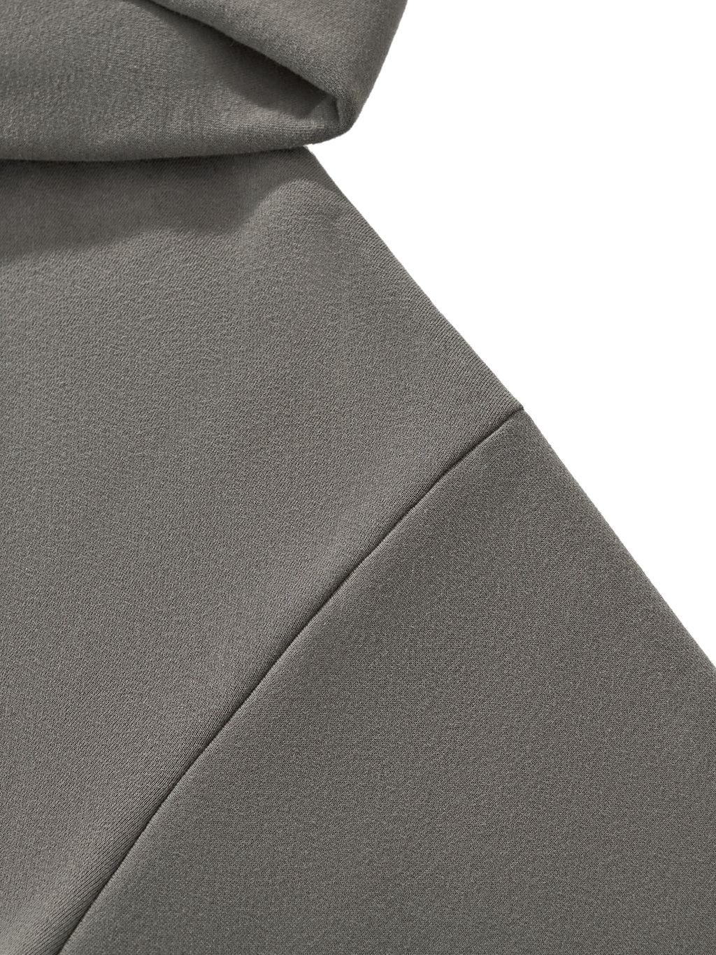 Close-up of Crossxnails Fleeced Boxy Hoodie showcasing soft, premium fabric in a gray hue with boxy fit and drop shoulders.