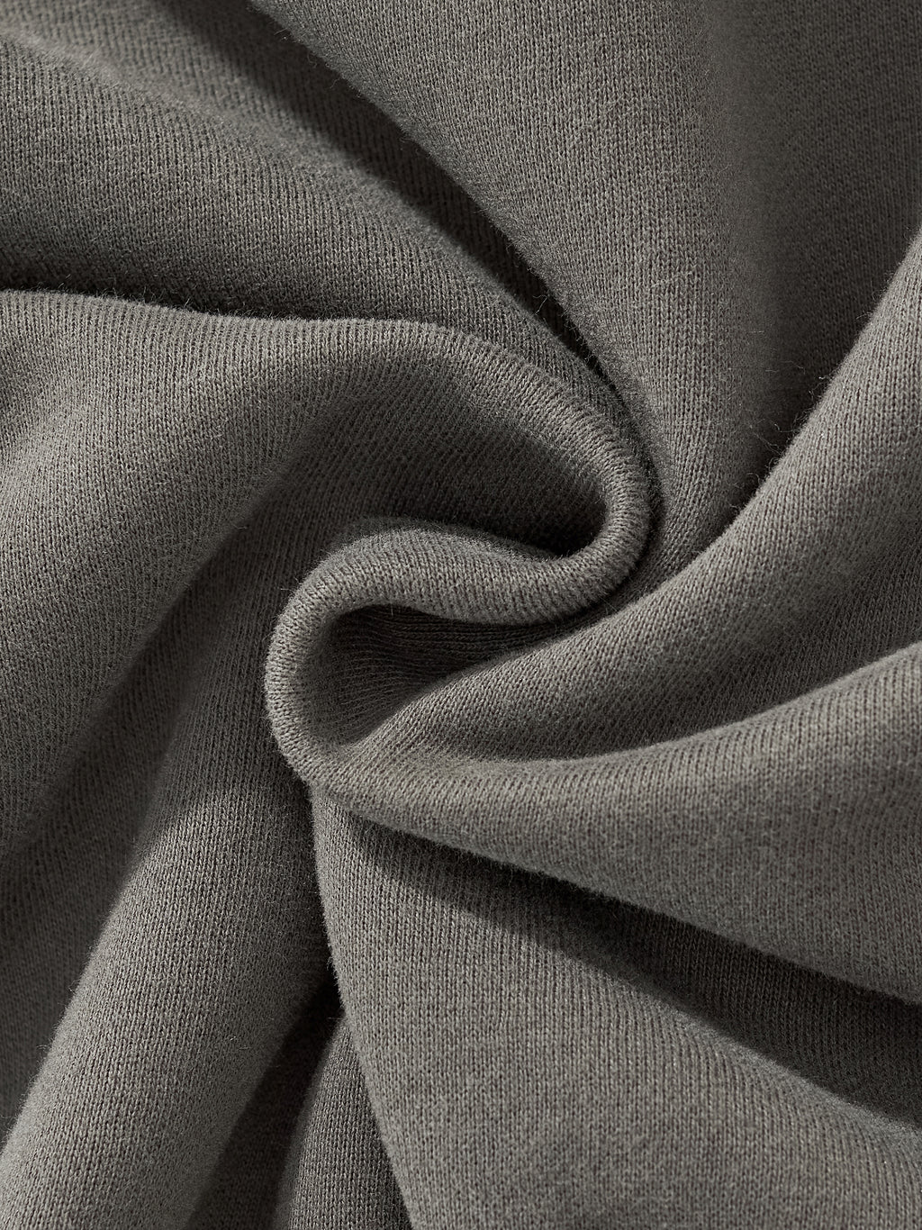 Close-up of soft, gray fleece fabric highlighting the premium texture for the Crossxnails Fleeced Boxy Hoodie.