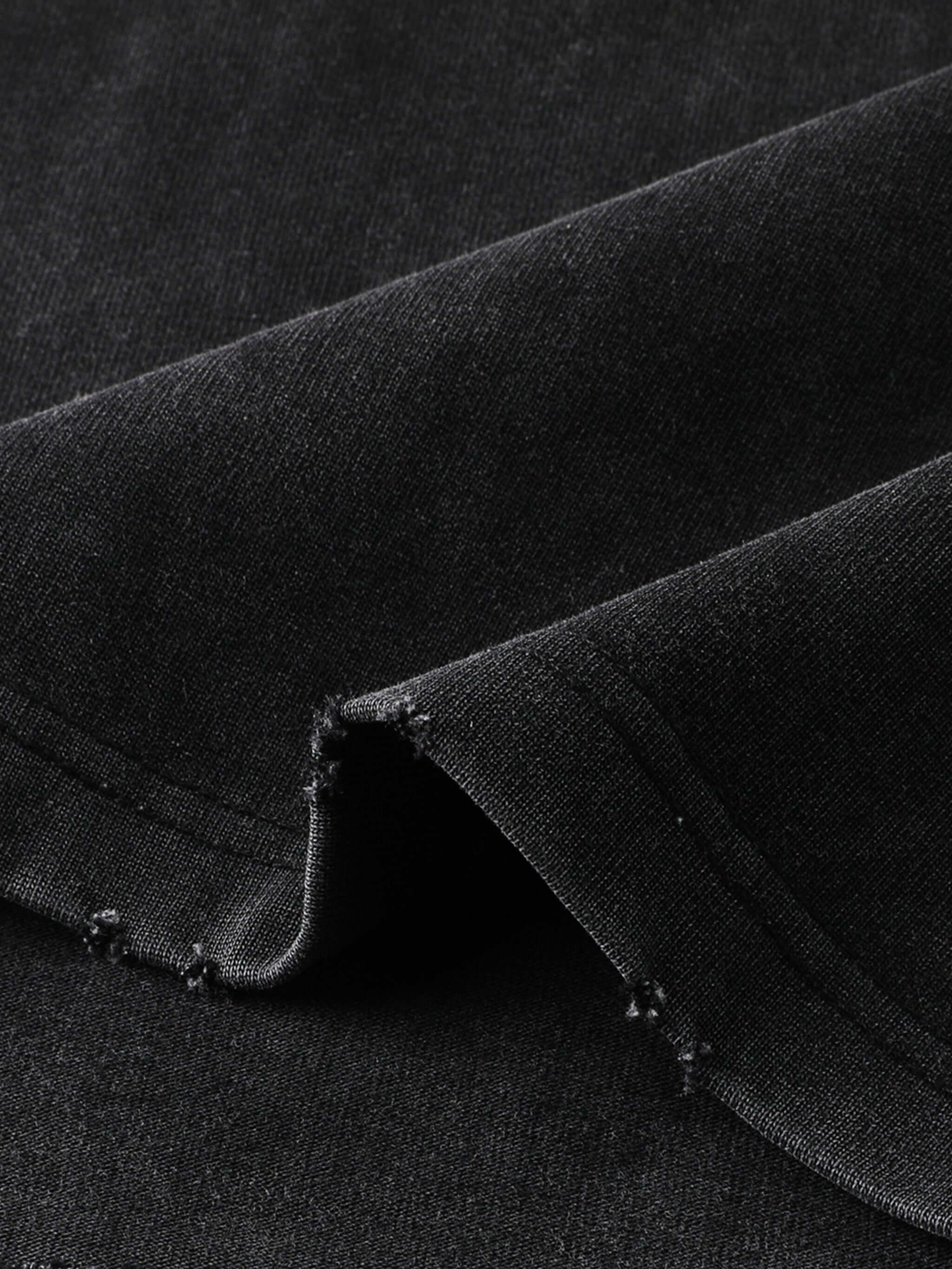 Close-up of premium 430gsm black cotton fabric, showcasing texture for Crossxnails oversized t-shirt.