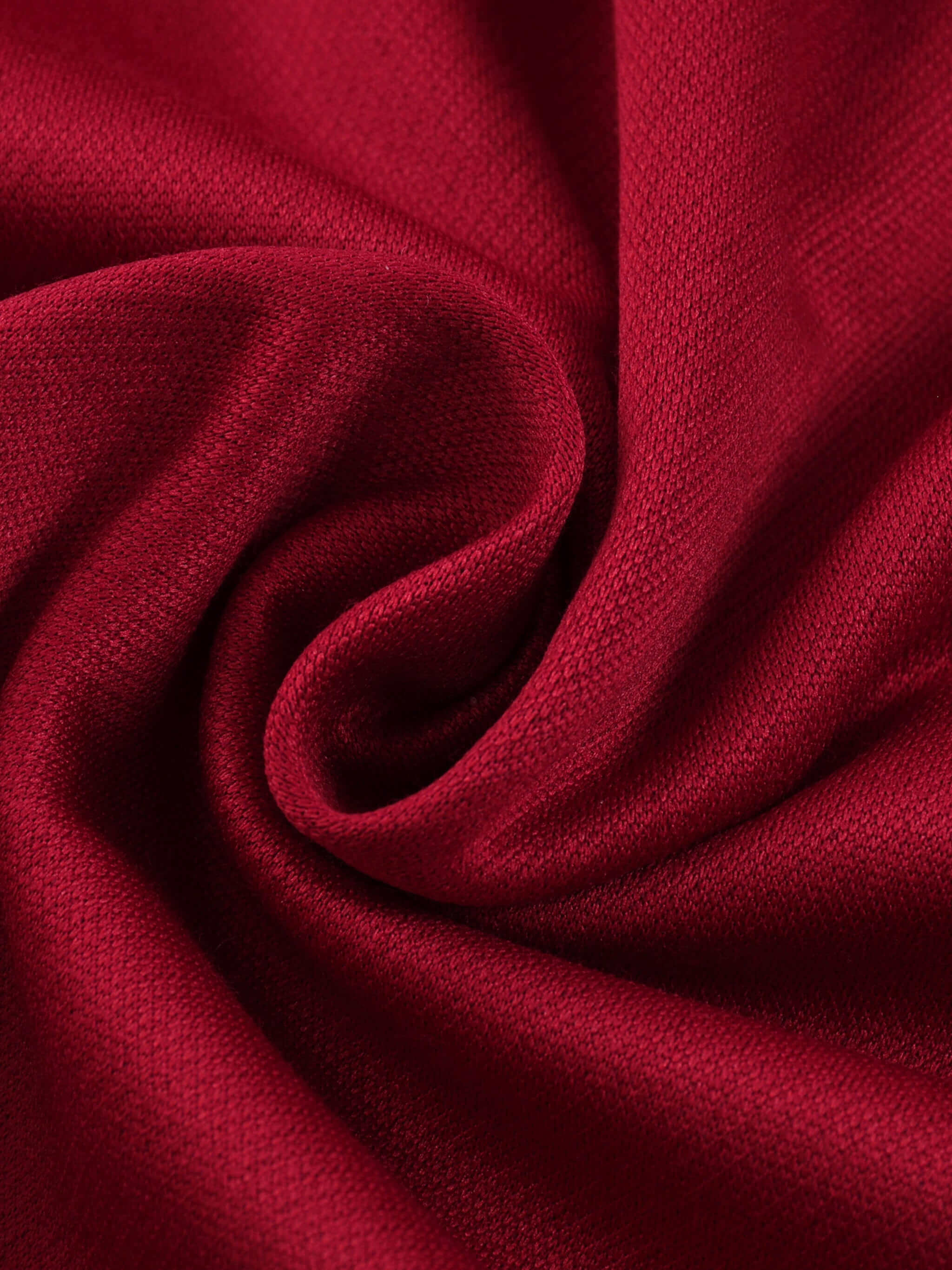 Close-up of rich red fabric, showcasing soft texture, ideal for relaxed fit streetwear. Perfect for Crossxnails clothing.